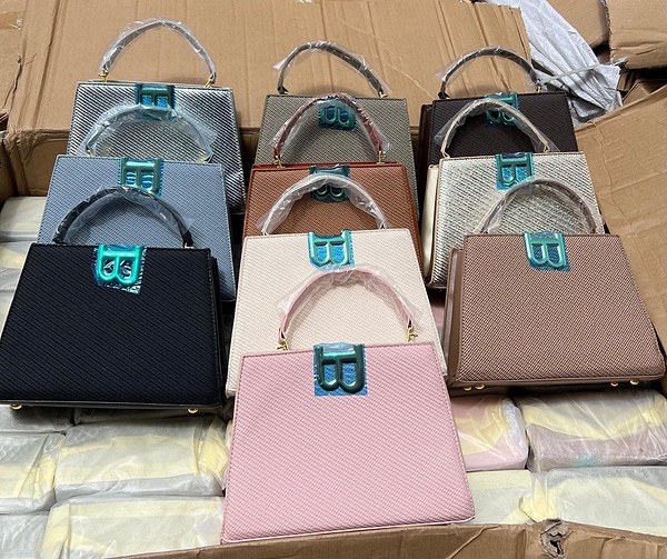 Lady's "B-Buzz" style bags