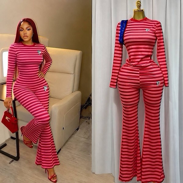 pink and red striped two-piece set features a long-sleeved top