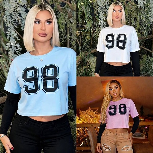 graphic crop top features a bold "98" print and is reminiscent of football jersey styles