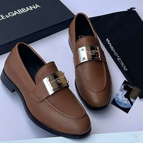 Leather Dolce & Gabbana dress loafers feature a prominent metallic brand plaque across the vamp 2
