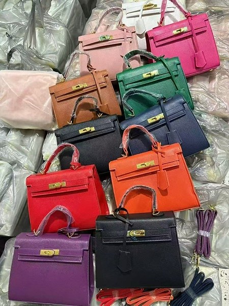 structured top-handle bags feature a distinctive metal turn-lock closure