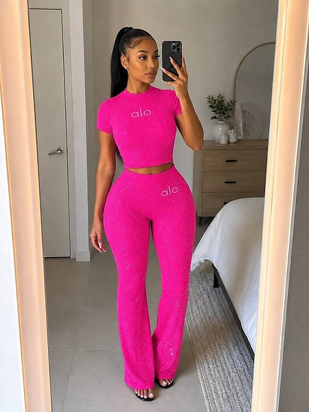 two-piece outfit featuring a glittered crop top and matching flared trousers 3
