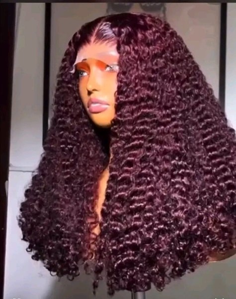 voluminous pixie curly human hair wig in a rich burgundy (99J) sdd 24 inches 5*5 lace closure.